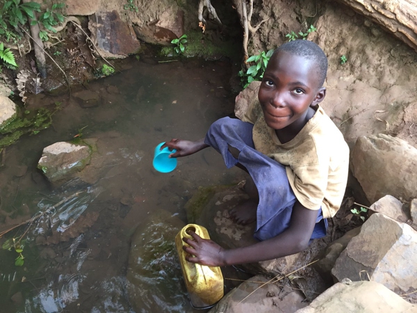 Dirty waterhole Karagwe with foul water